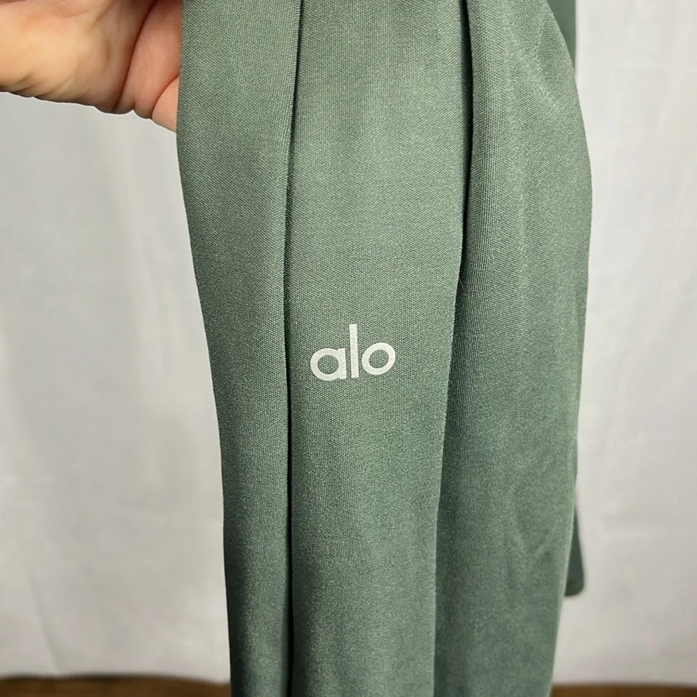Alo‎ Yoga High-Waist Zip it Flare Legging in Dark Cactus Green.